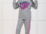 supergirl jogging suit.jpg